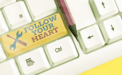 Text sign showing Follow Your Heart. Business photo text Motivation to do what is right and fulfill...