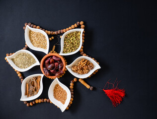 White plates contains some ingredients for eid sweets