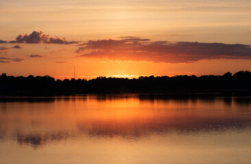 Fototapeta na wymiar Michigan summer sunrise. Upper Crooked Lake