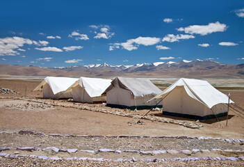 Camping tents near Tso Moriri lake in Changthang Plateau in Ladakh, Jammu and Kashmir, North India