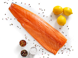 Fresh raw salmon fillet on white background
