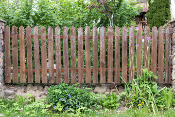 A wooden fence in the village.