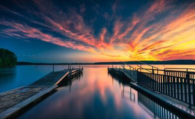 Fototapeta na wymiar Brilliant Sunset over the Lake with Long Exposure
