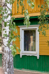 Window in the cottage. Window in a rural house.