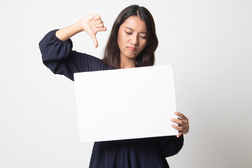 Young Asian woman show thumbs down with white blank sign.