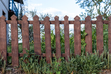 A wooden fence in the village.