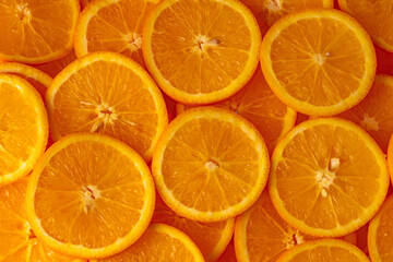 fresh orange slices background. top view