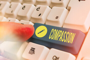 Writing note showing Compassion. Business concept for empathy and concern for the pain or...