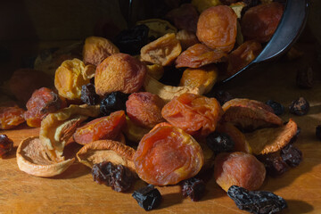 Dried fruits are scattered on a plane