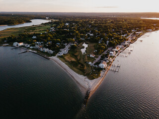 Arial landscape photograph taken in Warwick Rhode Island.  Beautiful ocean waters surrounding a...