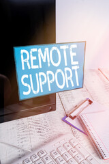 Writing note showing Remote Support. Business concept for type of secure service, which permits...