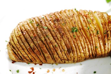 Homemade Hasselback Potatoes, selective focus