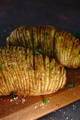 Homemade Hasselback Potatoes, selective focus