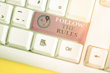 Handwriting text writing Follow The Rules. Conceptual photo learn to conform the compliance,...