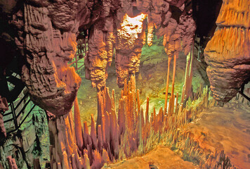 Stalactites and stalagmites inside of the Rei do Mato Grotto in Minas Gerais State. A stalactite is...