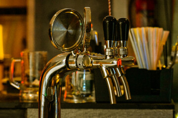 Style pedestal keg beer dispensing tower of stainless steel with three faucet.