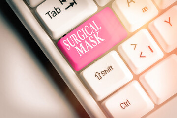 Conceptual hand writing showing Surgical Mask. Concept meaning worn by health professionals during...