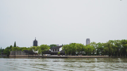 Chinese architecture by water in South Lake scenic area in Jiaxing, China