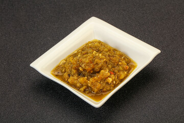 Green spicy sauce in the bowl