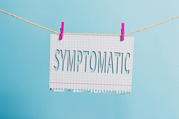 Text sign showing Symptomatic. Business photo text serving as symptom or sign especially of...