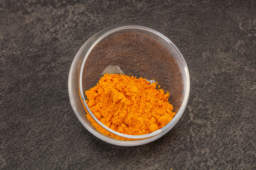 Tumeric powder in the bowl