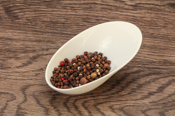 Peppercorn heap in the bowl