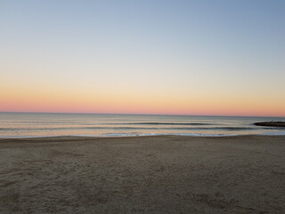 Sunset at de beach on a summer afternoon