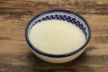 White sugar in the bowl