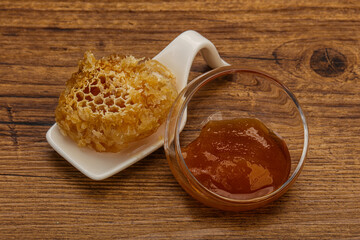 Natural honey in the bowl