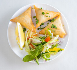 photos of samosas on a dish