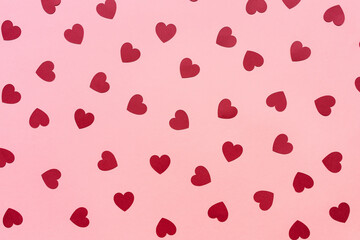 Romantic red and pink and green backround with red paper hearts. Love, dating and Valentines Day concept, copy space