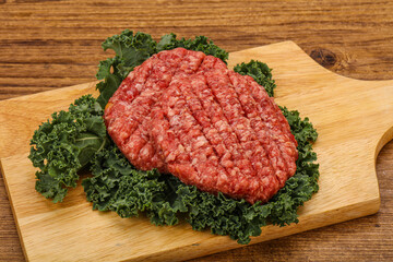 Raw beef burger cutlet for cooking
