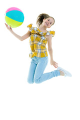 Fototapeta premium A teenage girl is jumping