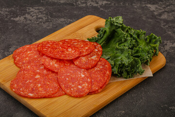 Italian spycy pepperoni sausage slices