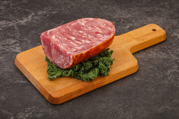 Beef ham piece over board