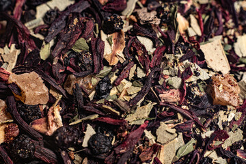 Macro from assorted tea leaves and fruits
