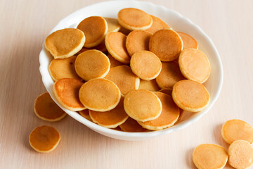 Delicious Freshly Cooked Pancake Cereal In A Bowl, Top View.