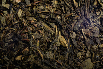 Macro from assorted tea leaves and fruits
