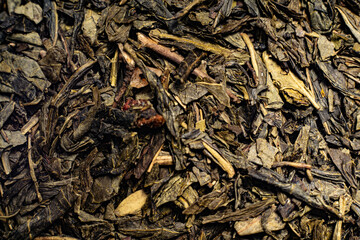 Macro from assorted tea leaves and fruits
