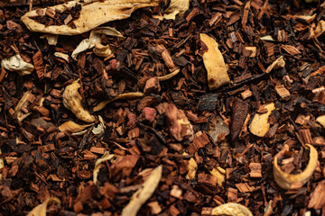 Macro from assorted tea leaves and fruits
