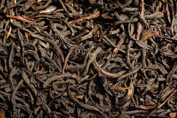 Macro from assorted tea leaves and fruits
