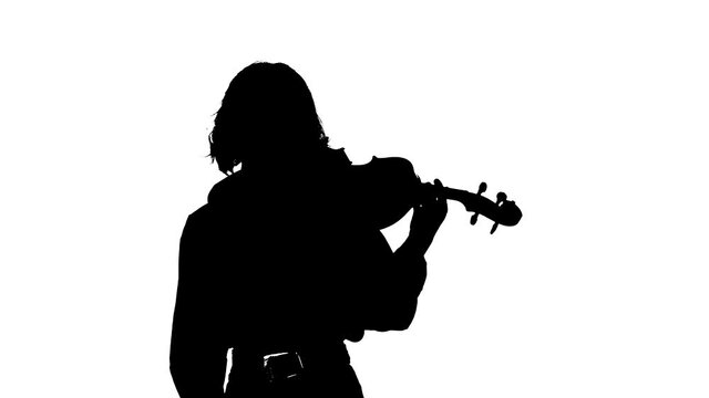 black silhouette on a white background, closeup of young woman violinist playing the classical violin in front of the spotlight