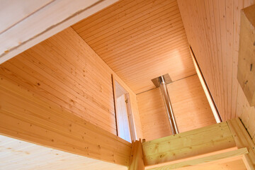 Fototapeta na wymiar Interior decoration of a wooden house under construction. Development of a residential Villa.