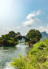 Fototapeta na wymiar Dragon bridge over Yulong river at Yangshuo, Guangxi, China