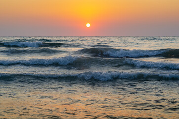 Panele Szklane Podświetlane  Sunset over the sea