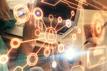 Double exposure of man and woman working together and social network theme hologram drawing. People connection concept. Computer background.