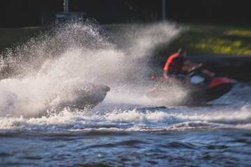 View of jet ski in motion, group of jet skiers with a big water splash