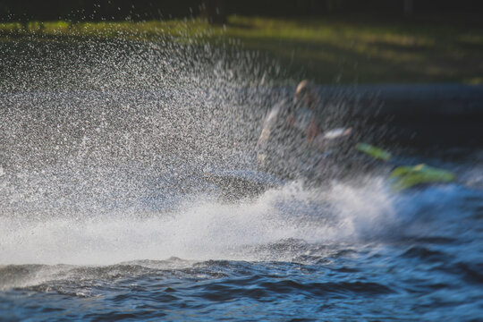 View Of Jet Ski In Motion, Group Of Jet Skiers With A Big Water Splash