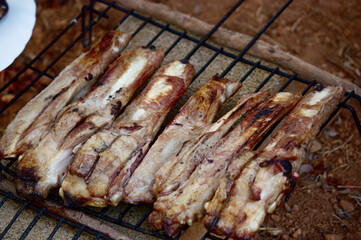 Grilled pork meat during a barbecue