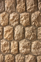 Hexagonal stone pattern on a decorated wall